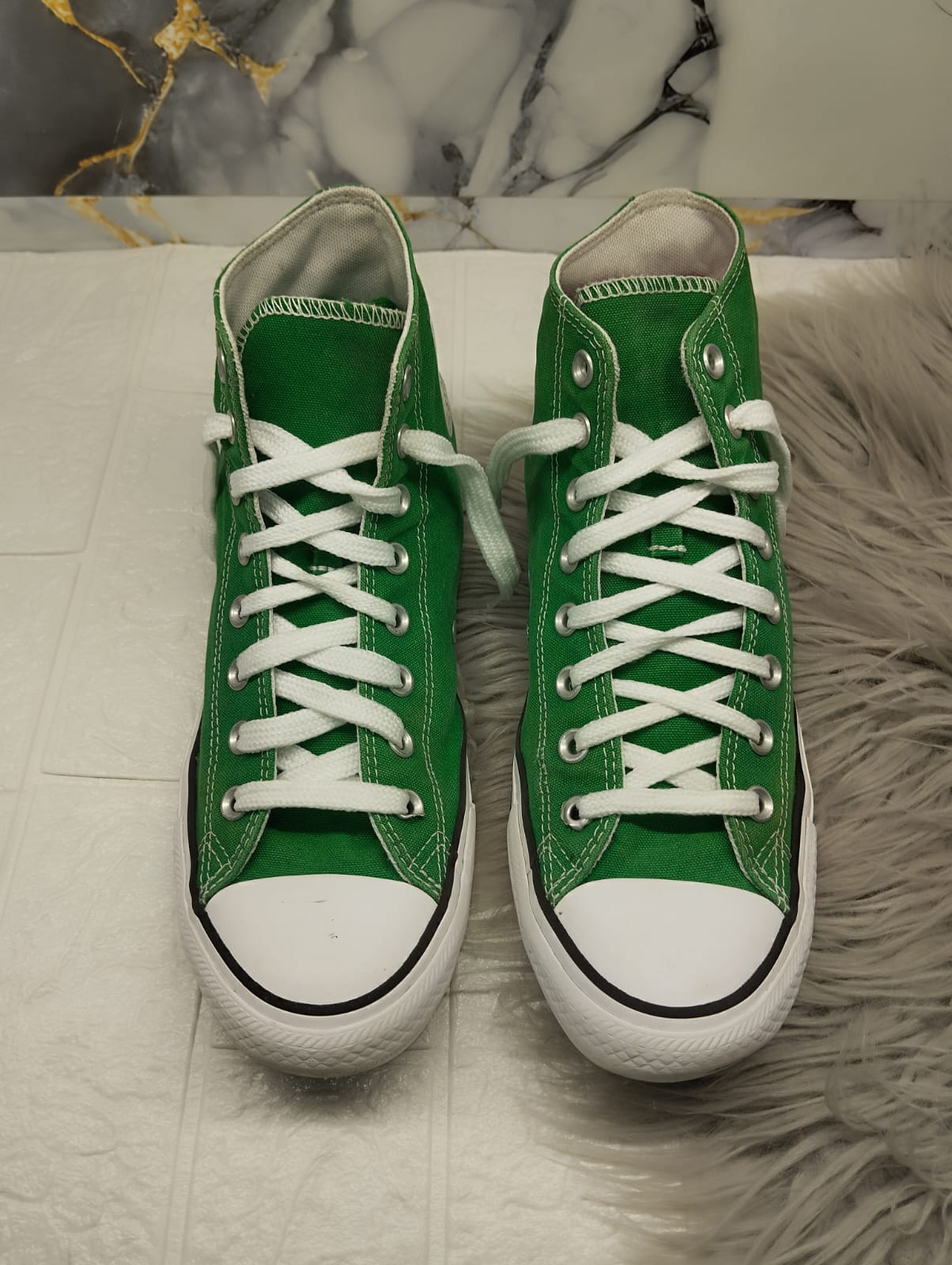 Green high rise converse
